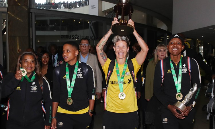 Victorious Banyana back home with trophy